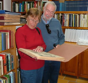 Historians Historians read a copy of an historic newspaper